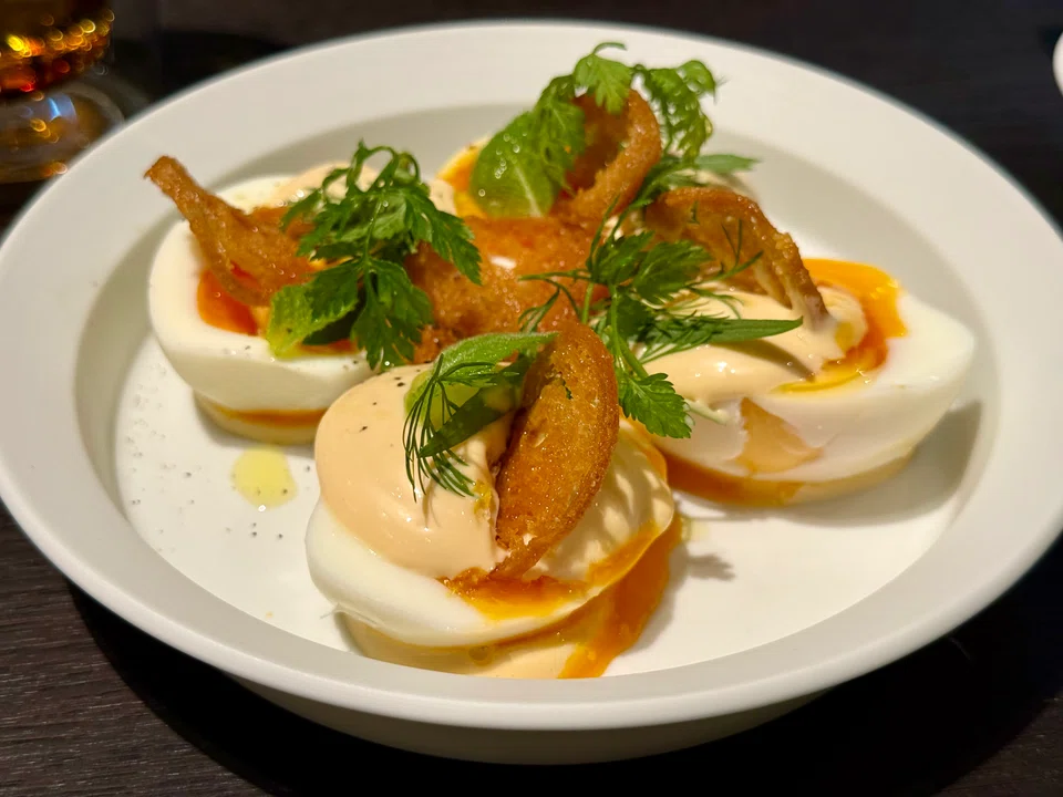 Hard-boiled eggs topped with a soy-sherry aioli.