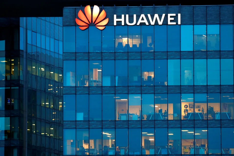 FILE PHOTO: A view shows a Huawei logo at Huawei Technologies France headquarters in Boulogne-Billancourt near Paris, France, February 17, 2021. REUTERS/Gonzalo Fuentes/File Photo