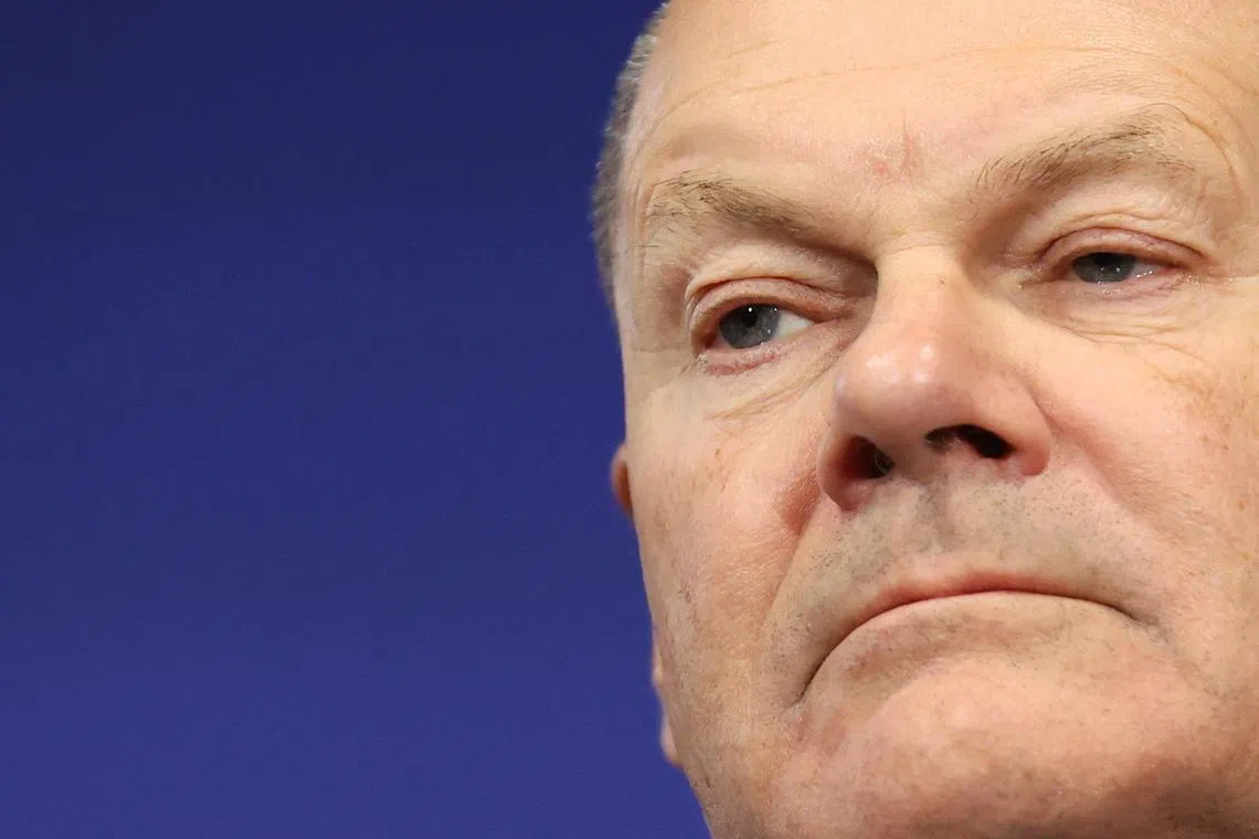 German Chancellor Olaf Scholz’s political rivals have threatened to block his minority government from passing laws unless he immediately seeks a confidence vote.