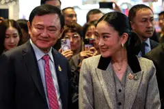 Thaksin Shinawatra, Thailand's former prime minister, left, with his daughter Paetongtarn Shinawatra, Thailand's suspended prime minister. If the verdict goes against her, Paetongtarn would become the third Shinwatra to be ousted early as premier.