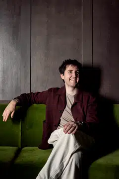 Josh Niland wears a wool pullover, jacket and trousers by Zegna.