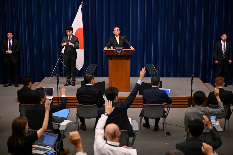 Japan's new Prime Minister Shigeru Ishiba taking questions from reporters during a press conference. “I want this Cabinet to be one that trusts the people and is trusted by the people,” says Ishiba.