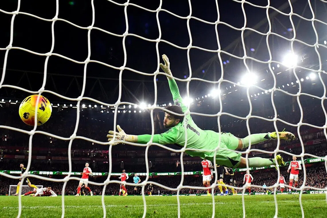 Arsenal's goalkeeper David Raya watches haplessly as Manchester United's Matheus Cunha scores the team's third goal at the Emirates stadium, London, Britain, Jan 25, 2026.