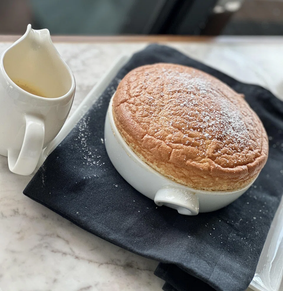 Sweet ending of freshly made fluffy souffle.