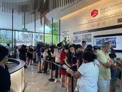 Potential buyers at the preview of Bukit Sembawang Estates' Liv @ MB. The company has reported a 14.5 per cent fall in revenue to S$76.5 million for the half year ended Mar 31, 2023.