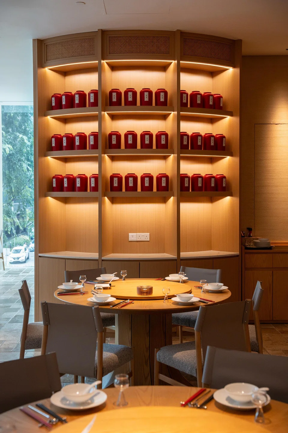 Ban Lan features a wall of red tea tins as its focal point.