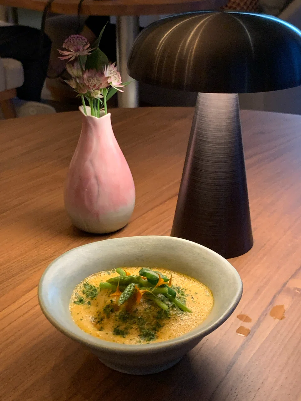 Bouncy ravioli of prawn otah and lobster in coconut pineapple broth.