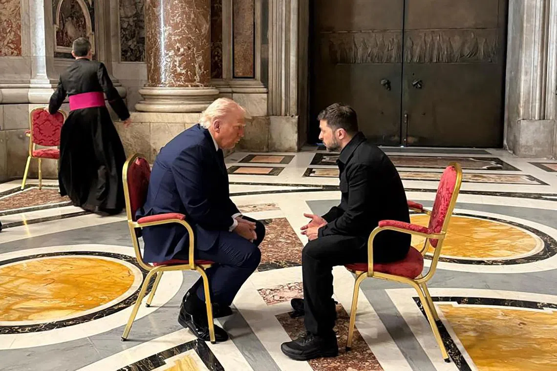 (FILES) In this handout photograph taken and released by the Ukrainian Presidential Press Service on April 26, 2025, Ukraine's President Volodymyr Zelensky (R) meets with US President Donald Trump (L) on the sidelines of Pope Francis's funeral at St. Peter's Basilica at the Vatican. The United States and Ukraine on April 30, 2025 signed a minerals deal after a two-month delay, in what President Donald Trump's administration called a new form of US commitment to Kyiv after the end of military aid. Ukraine said it secured key interests after protracted negotiations, including full sovereignty over its own rare earths, which are vital for new technologies and largely untapped. (Photo by Handout / UKRAINIAN PRESIDENTIAL PRESS SERVICE / AFP) / RESTRICTED TO EDITORIAL USE - MANDATORY CREDIT "AFP PHOTO / UKRAINIAN PRESIDENTIAL PRESS SERVICE" - NO MARKETING NO ADVERTISING CAMPAIGNS - DISTRIBUTED AS A SERVICE TO CLIENTS
