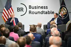 US President Donald Trump (left) speaking at the Business Roundtable's quarterly meeting on Mar 11 in Washington, DC. Businesspeople are the only people with the personal heft and institutional power to act as a restraint on Trump.