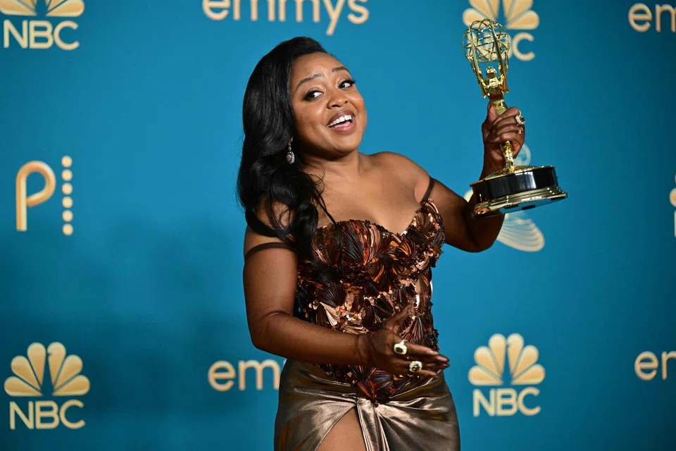 US writer Quinta Brunson poses with the Emmy for Outstanding Writing For A Comedy Series for "Abbott Elementary" during the 74th Emmy Awards at the Microsoft Theatre in Los Angeles, California, Sept 12, 2022. 