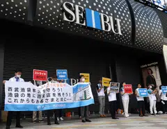 Union workers of Sogo & Seibu striking in front of the company's flagship Seibu Ikebukuro store in Tokyo.