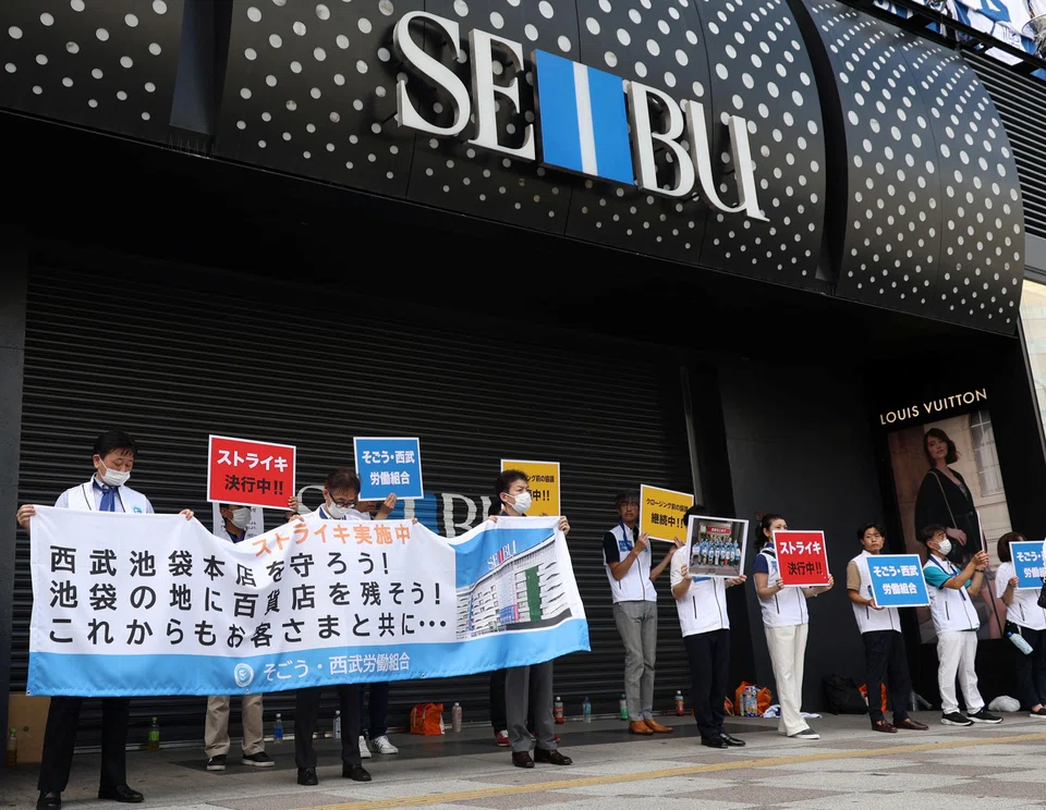 Union workers of Sogo & Seibu striking in front of the company's flagship Seibu Ikebukuro store in Tokyo.