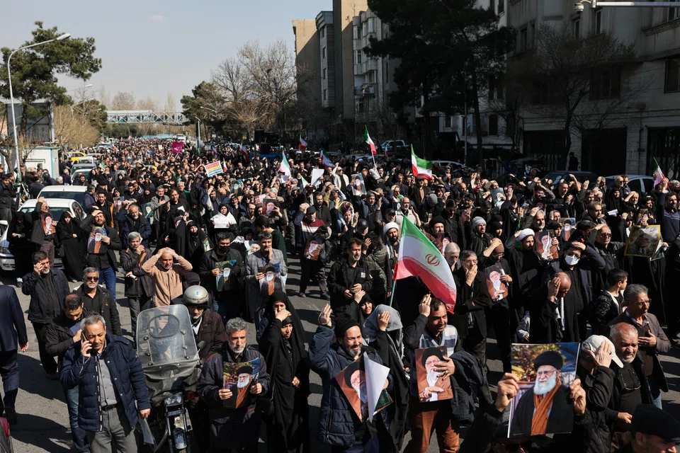 Demonstrators attend an anti-Israeli and US rally after Friday prayer, amid the US-Israeli conflict with Iran, in Teheran on Mar 6.