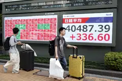 Tokyo stocks edged up with Shanghai, Sydney, Wellington and Jakarta shares but Hong Kong, Seoul, Singapore, Taipei and Manila stocks fell on Friday.
