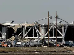 US authorities urge Amazon to improve safety after tornado deaths in Illinois last year.