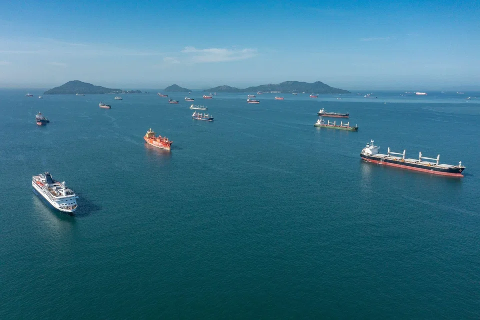 Cargo ships wait in the anchor zone to cross the Panama Canal from the Pacific entrance near Panama City, Panama, on Sept 1, 2023. Ships have been waiting for days as the congestion to cross from both sides  increase due to the intense droughts in the country.