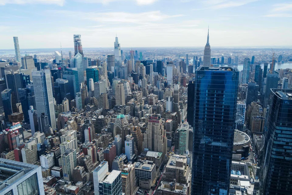The Midtown Manhattan skyline is seen from the 'The Edge' observation deck in New York City on April 8. The former Le Penthouse joins a handful of notable properties that have been connected to bankruptcy in recent years. 