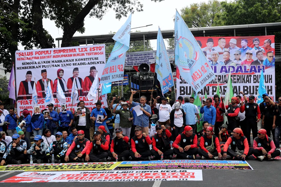 Indonesian workers staging a protest against the government's omnibus law on Sep 30, demanding better wages.