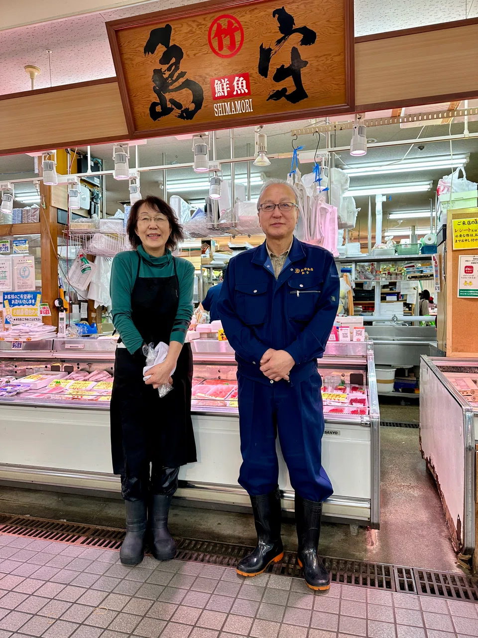 Fish shop owners Masayoshi Shimamori (right) and Ikuko Sasaki.