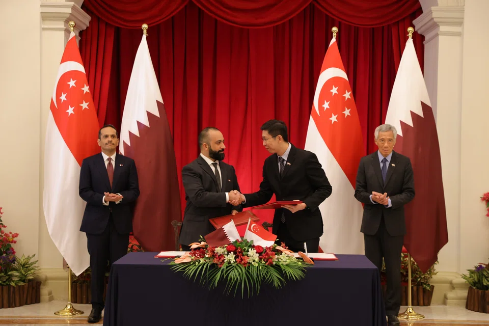 Qatar PM Sheikh Mohammed bin Abdulrahman bin Jassim Al Thani (left) and Singapore's PM Lee Hsien Loong (right) witnessed the signing of the five agreements on Aug 24. 