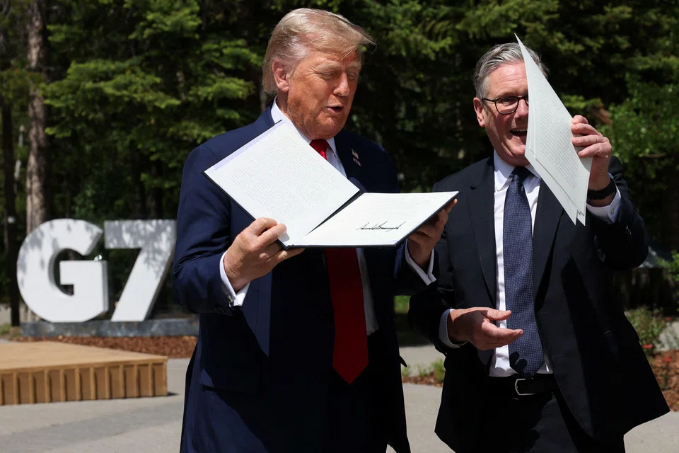 The deal is the first sealed by Trump (left) following his decision to ratchet up tariffs against countries worldwide. 