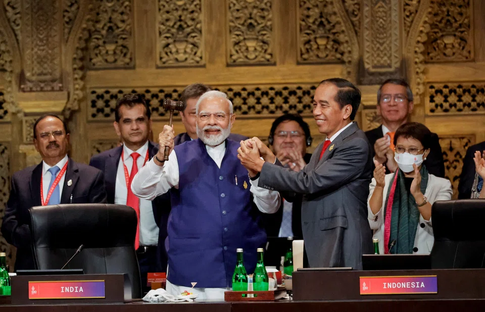 India's Prime Minister Narendra Modi and Indonesia's President Joko Widodo at the end of the G20 Summit in Bali. India will chair the G20 in 2023.