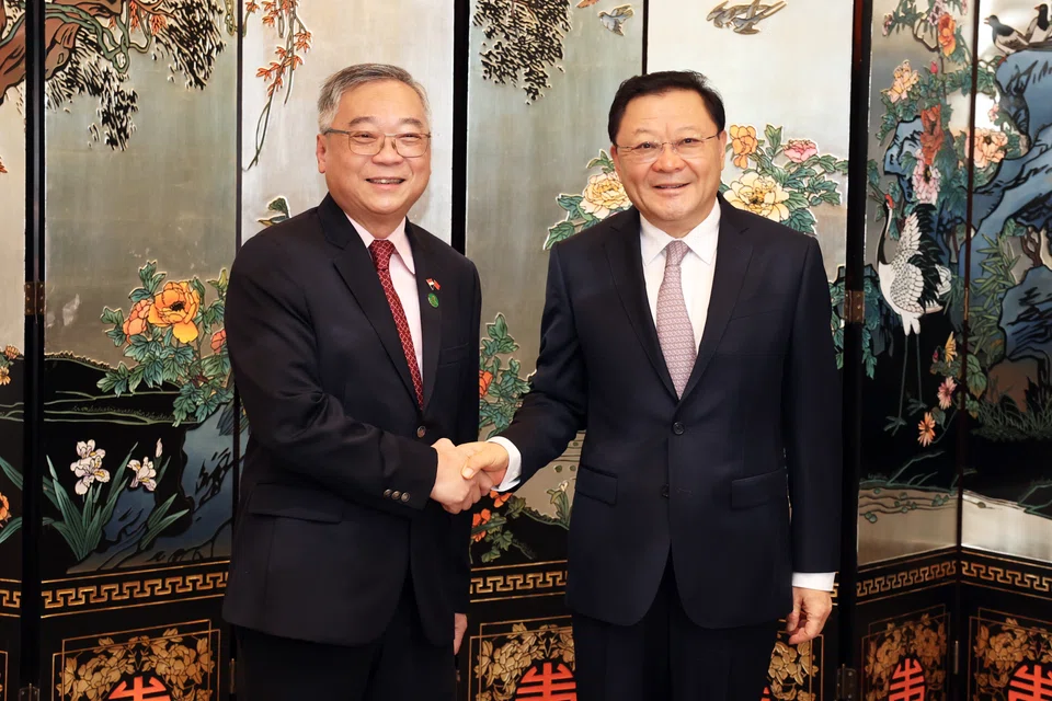 DPM Gan Kim Yong (left) meeting Guangdong Governor Wang Weizhong in Guangzhou, his first stop in a five-day working visit to China.