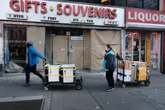 Workers making deliveries in New York City.  The job market in the United States is now strong; businesses are reluctant to let go of workers, though finance, tech and real-estate firms have let go thousands of workers in recent months. 