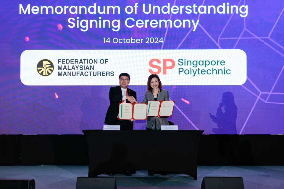 Federation of Malaysian Manufacturers president Soh Thian Lai (left) and Singapore Polytechnic deputy principal of development Georgina Phua at the Industrial Transformation Asia-Pacific event on Oct 14, 2024.