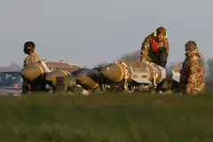 US military personnel with munitions at the RAF Fairford airbase in Gloucestershire, UK. Defence officials in Asia are growing alarmed that more American firepower will shift over time if the Middle East conflict drags on.