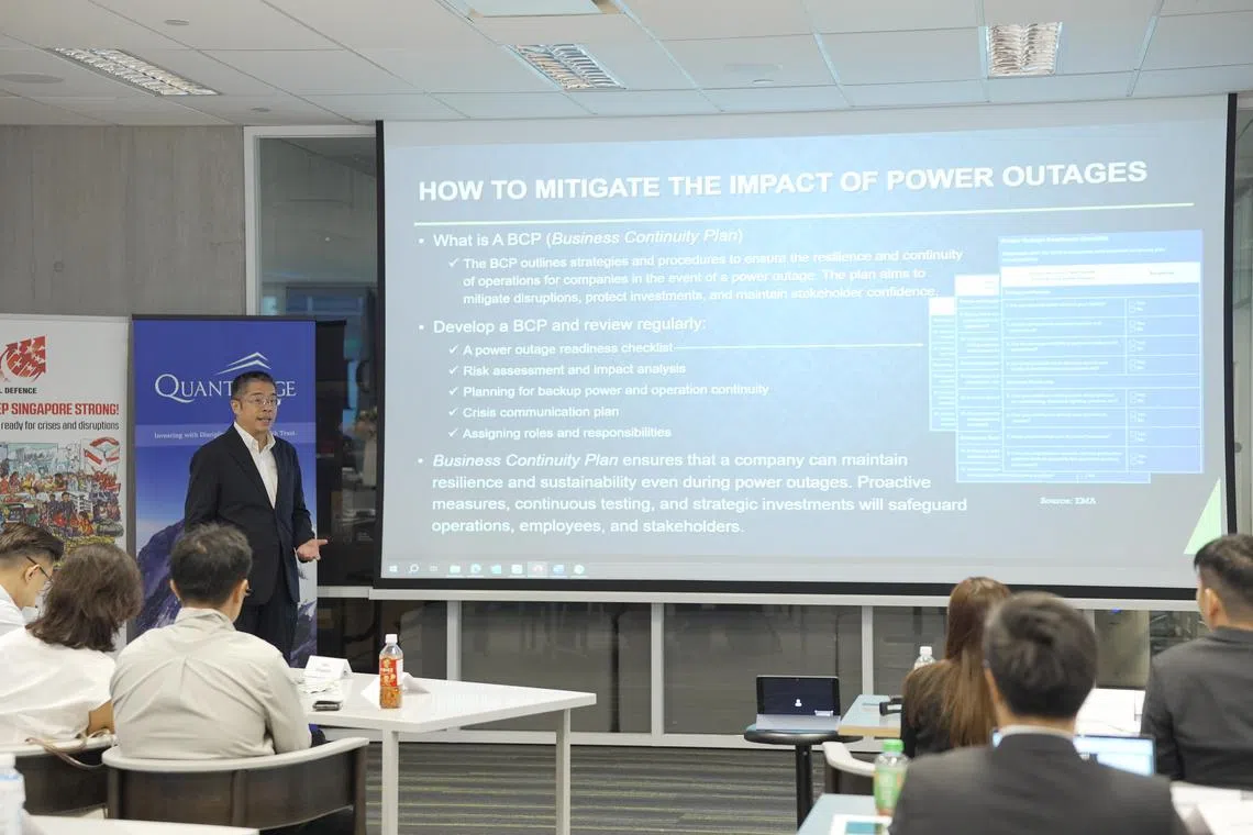 Managing director of Concord Clean Energy Research Center, Dr Zhang Bo, sharing on how to deal with power disruptions during the Exercise SG Ready table-top exercise.