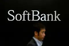 SoftBank posted a narrower quarterly net loss of 174.3 billion yen compared with a loss of 477.6 billion in the same period a year earlier.