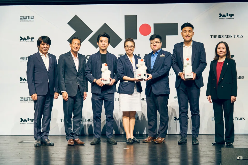 (From left) SUTD's Tai Lee Siang; Senior Minister of State for Digital Development and Information and National Development Tan Kiat How; LionsBot's Tan Wei Hua; Sengkang General Hospital's Moarie Grace Tan and Jeff Tang; MetaOptics Technologies'  Aloysius Chua; and BT editor Chen Huifen.