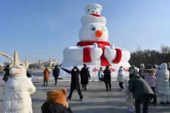 A snowman sculpture in Harbin. The city is enjoying a surge in visitors driven by social media.