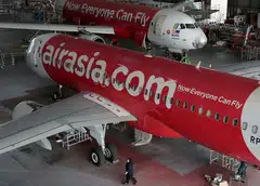 An AirAsia plane undergoing maintenance at Subang, Malaysia, July 15, 2024. Flight AK128, an Airbus A320, was on its way to Shenzhen but turned back to Kuala Lumpur International Airport due to “an abnormal indication in one of the engines”.