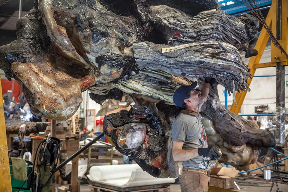 At Adrián Villar Rojas's workshop in Rosario, Argentina, the sculptor and modeller Ariel Torti at work on a giant sculpture for "The End of Imagination".
