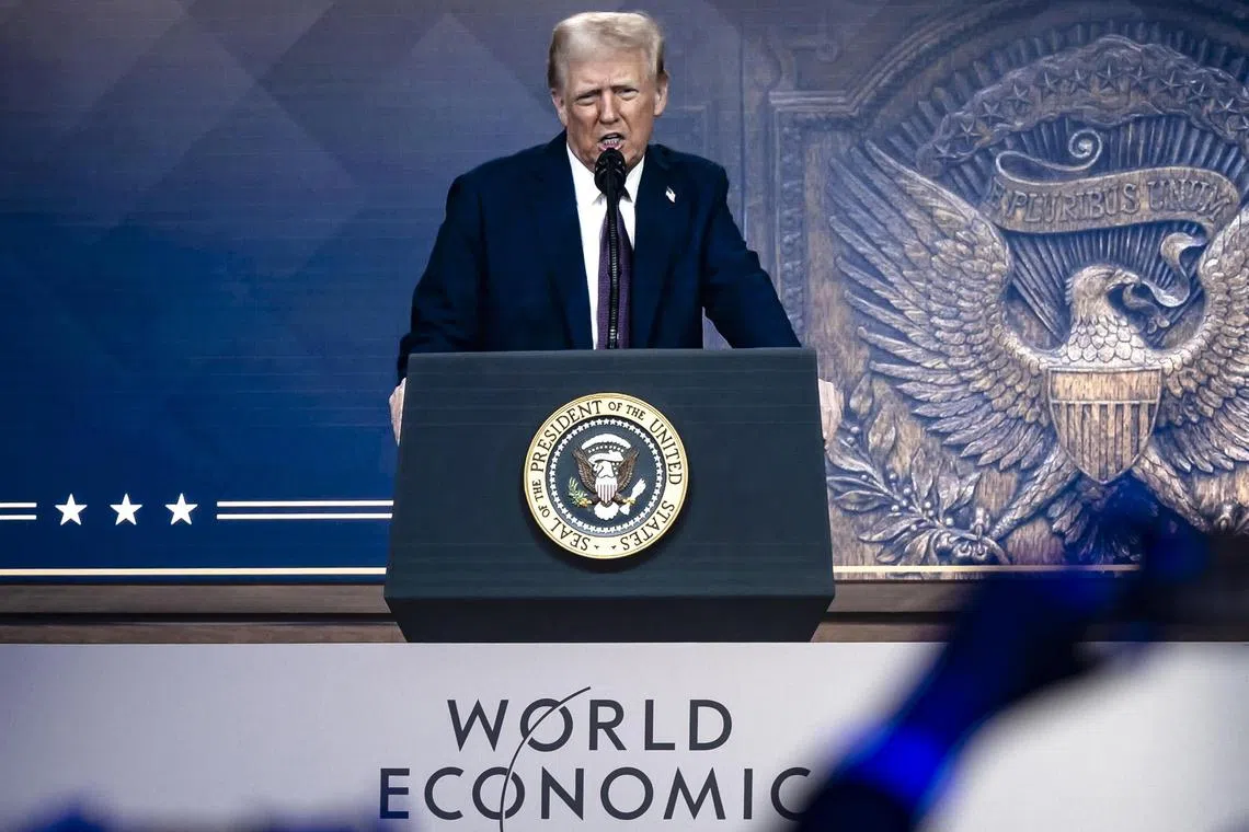US President Donald Trump addresses the audience via remote conferencing at the 55th annual meeting of the World Economic Forum in Davos, Switzerland, Jan 23, 2025. 
