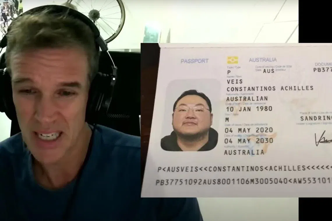 Former Wall Street Journal journalist Tom Wright in a screenshot from a livestream by Project Brazen, showing  an image of what is allegedly Jho Low's passport. The image, which came from a tip-off, suggests that Low is using the alias "Constantinos Achilles Veis" and a forged Australian passport.