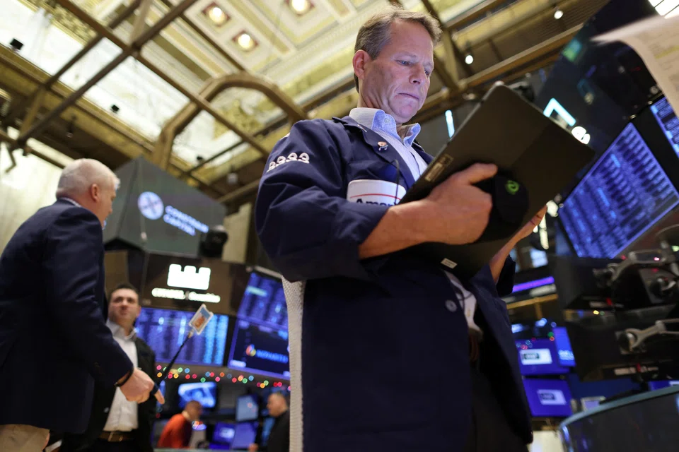 About 10 minutes into trading, the Dow Jones Industrial Average was down 0.4 per cent at 33,170.67.