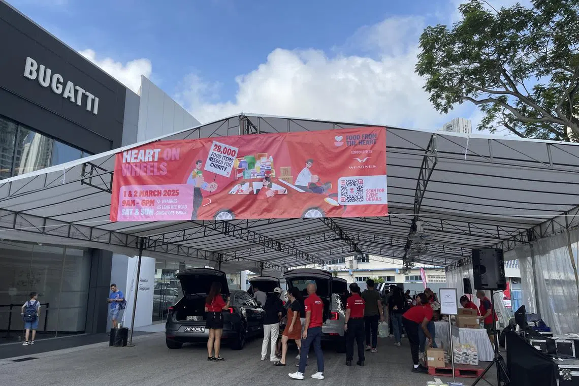 Car groups attend the Heart On Wheels initiative to donate food items, which will benefit lower-income households.