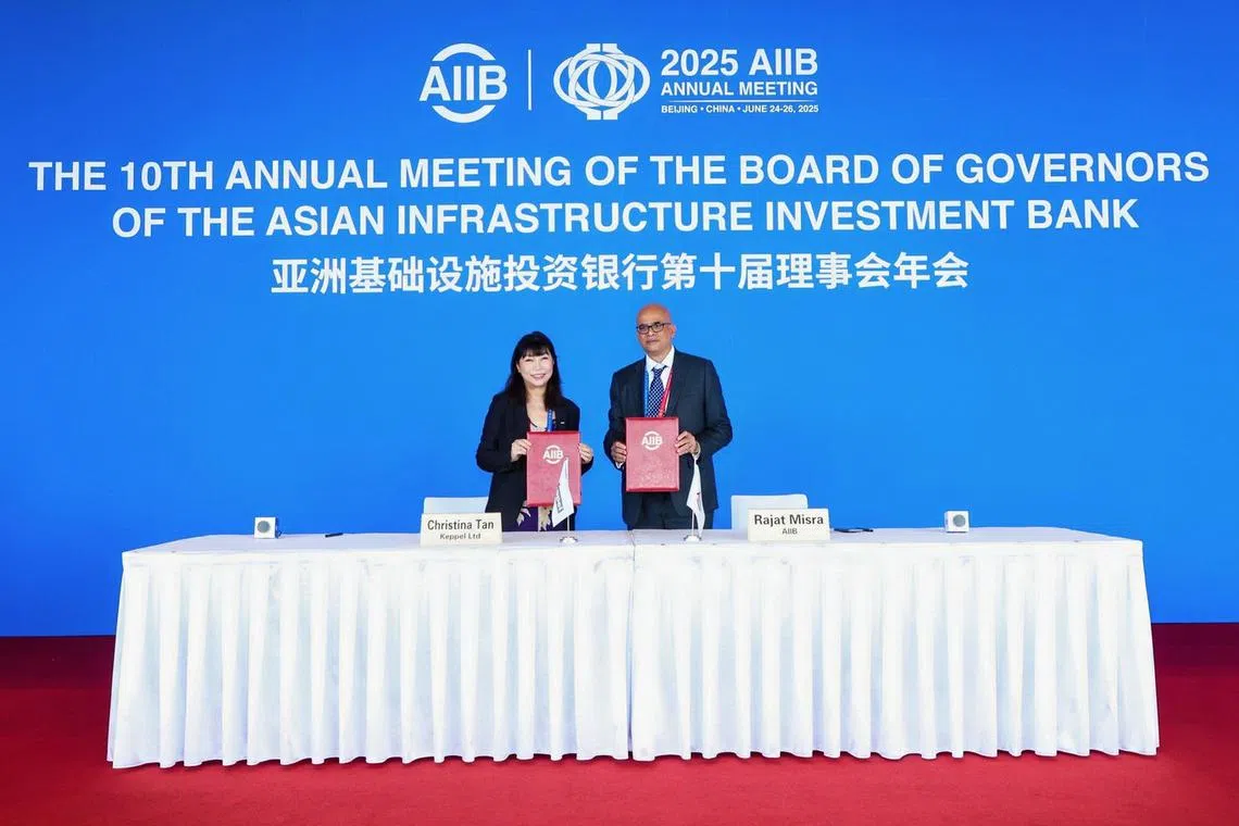 Christina Tan, Keppel’s chief executive for fund management, signed the deal with Rajat Misra, senior executive of AIIB.