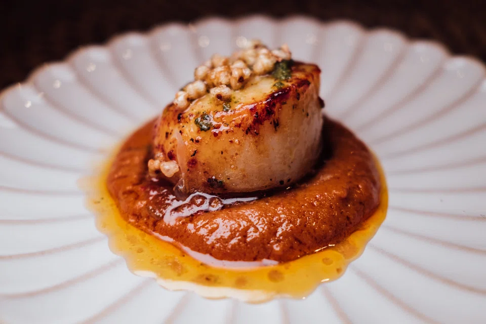 Hokkaido scallop with mango sambal and percik sauce.