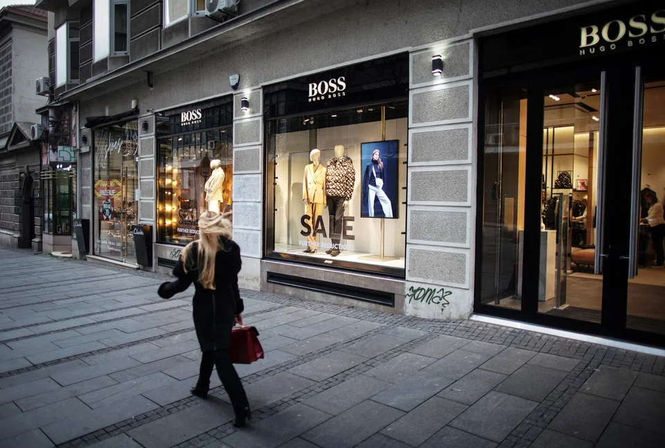 The premium fashion retailer said subdued global consumer sentiment continues to weigh on the sector due to uncertainty over US tariffs.