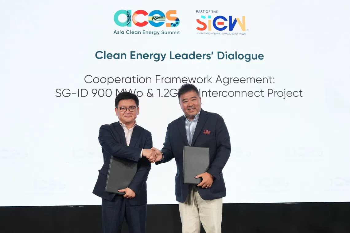 Sun Jinfeng, Singapore country manager of CRE International (left) and Frank Phuan, founder of Equator Renewables Asia.