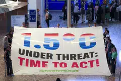Members of Greenpeace stage a protest during the Climate Change Conference in Bonn, Germany, June 16, 2025. 