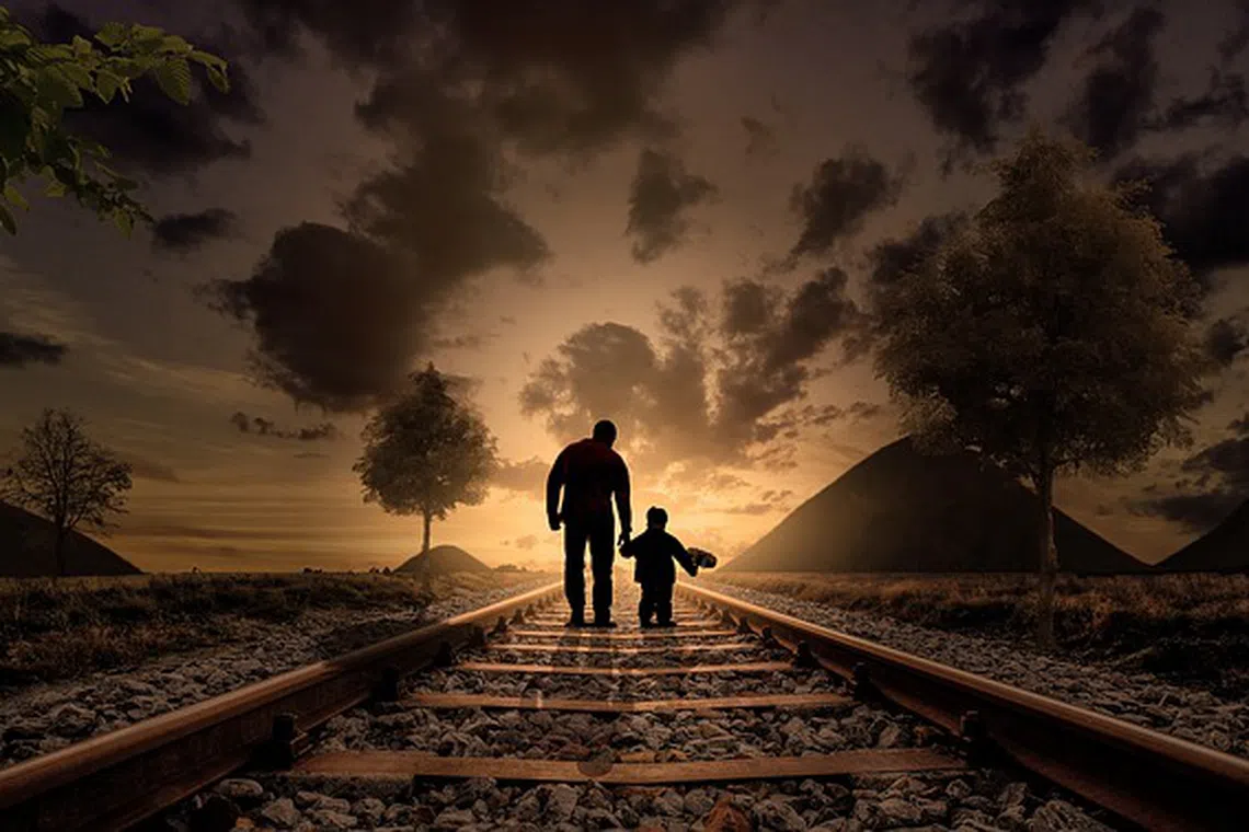 father and son, walking, railway
