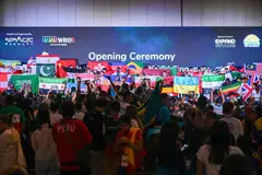 Participants from more than 90 countries attend the opening ceremony of the World Robot Olympiad competition in Singapore on Nov 26. 