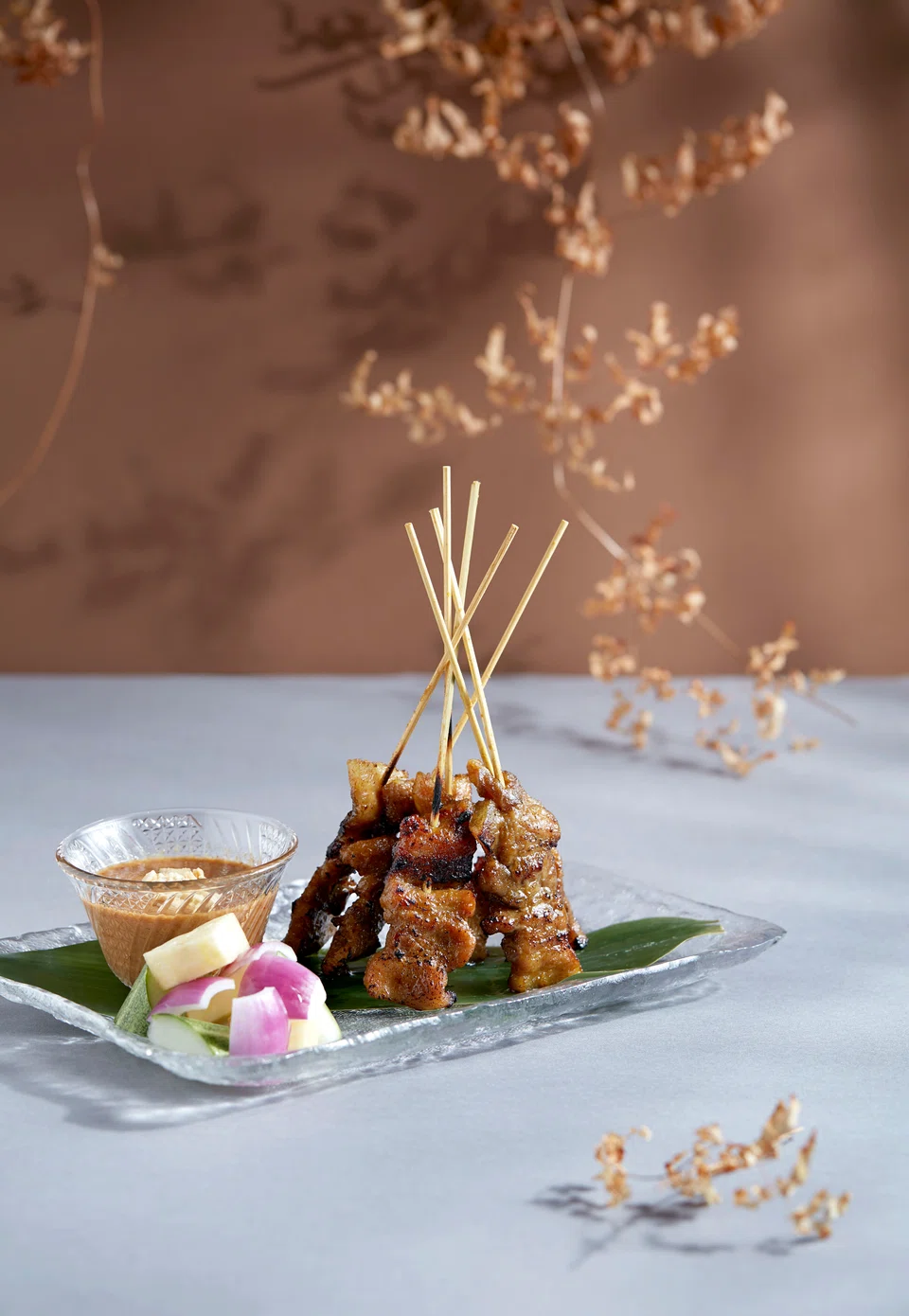 Juicy pork belly satay and peanut sauce