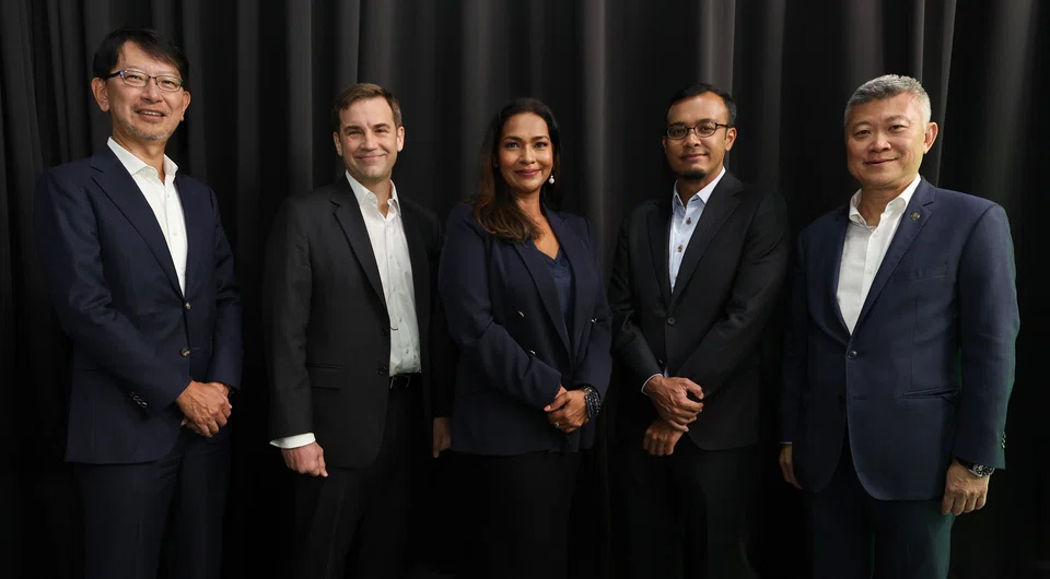 Participants at the panel discussion said South-east Asia's large population will create demand for new digital products and services. From left: Takeshi Sasaki, partner at Japanese private equity firm Advantage Partner; Geoff Howie, market strategist at the Singapore Exchange; Anita Gabriel, senior correspondent at BT; Khairul Anwar, director for South-east Asia at Enterprise Singapore; and Gregory Seow, global banking head and global head of financial institutions group at Maybank Singapore.