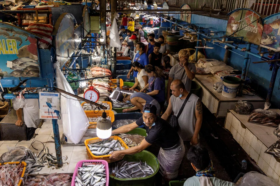 Vendors in a public market in Quezon City, the Philippines. The ADB expects moderating inflation to boost household consumption in the country in the second half of 2024. 
